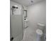 Bathroom featuring a glass enclosed shower, toilet and a vanity at 2127 Whites Mill Rd, Decatur, GA 30032