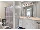Bathroom featuring a vanity with white cabinets and a shower with curtain at 955 Chandler Haulk Rd, Loganville, GA 30052