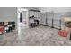 Spacious closet with open clothing racks and shoe storage, providing ample organization solutions at 955 Chandler Haulk Rd, Loganville, GA 30052