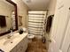Full bathroom features tiled floors and shower with updated fixtures at 2550 Kentshire Way, Lawrenceville, GA 30044