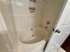 Close-up of the bathtub featuring a shower caddy at 2550 Kentshire Way, Lawrenceville, GA 30044