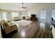 Inviting living room with hardwood floors, high ceilings, fireplace and plenty of natural light at 2550 Kentshire Way, Lawrenceville, GA 30044