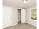 The bedroom has new vinyl floors, a window, and a closet at 272 Old Sudie Rd, Hiram, GA 30141