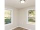 Bright bedroom with two windows overlooking the landscape at 272 Old Sudie Rd, Hiram, GA 30141