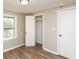 The bedroom has new vinyl floors, a window, and a closet at 272 Old Sudie Rd, Hiram, GA 30141