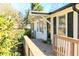 House featuring a front porch with white siding and black shutters, near lush greenery at 272 Old Sudie Rd, Hiram, GA 30141