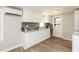 Well-appointed kitchen with white cabinets, modern backsplash, and ample counter space at 272 Old Sudie Rd, Hiram, GA 30141