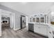 Bright kitchen open to living room with stainless steel appliances and ample counter space at 4605 Tims Pl, Snellville, GA 30039