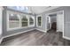Sitting Area features grey-toned walls and flooring with ample lighting at 4605 Tims Pl, Snellville, GA 30039