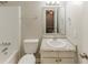 A well-lit bathroom with a shower and granite-topped vanity at 6715 Kimberly Mill Rd, Atlanta, GA 30349