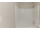 Bathroom features a clean, white shower-tub combo and simple fixtures at 6715 Kimberly Mill Rd, Atlanta, GA 30349