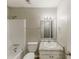 Bathroom features include a shower and tub combination, a vanity with a sink, and a neutral color scheme at 6715 Kimberly Mill Rd, Atlanta, GA 30349
