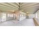 Large screened porch with lots of natural light coming through the windows at 6715 Kimberly Mill Rd, Atlanta, GA 30349