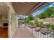 A view of the exterior balcony overlooking the parking and trees at 1719 Woodcliff Ne Ct, Atlanta, GA 30329