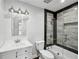 Modern bathroom with tub-shower, updated vanity and great lighting at 1719 Woodcliff Ne Ct, Atlanta, GA 30329