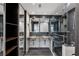 Modern bathroom featuring double sinks, a glass-enclosed shower, and stylish fixtures at 1719 Woodcliff Ne Ct, Atlanta, GA 30329