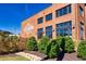 City Center building with decorative brick and landscaping at 2255 Windsor Bluffs Dr, Cumming, GA 30041