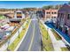 Charming street view showcasing tree-lined sidewalks and vibrant storefronts, creating a welcoming community atmosphere at 2255 Windsor Bluffs Dr, Cumming, GA 30041