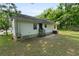 View of the back of the house, including the yard and patio area at 354 Henry Aaron Sw Ave, Atlanta, GA 30310