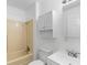 Well-maintained bathroom featuring neutral colored walls, a tub and white cabinetry at 354 Henry Aaron Sw Ave, Atlanta, GA 30310