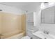 Clean bathroom featuring white cabinets, and shower-tub with tan walls at 354 Henry Aaron Sw Ave, Atlanta, GA 30310