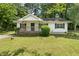 Charming single-story home with a front porch and well-maintained lawn at 354 Henry Aaron Sw Ave, Atlanta, GA 30310