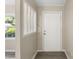 Light filled foyer showing fresh neutral paint and wood-look flooring at 354 Henry Aaron Sw Ave, Atlanta, GA 30310