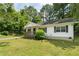 Charming home exterior with a covered porch and curb appeal at 354 Henry Aaron Sw Ave, Atlanta, GA 30310