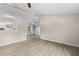 Sunlit open-concept living room featuring hard surface flooring, and neutral paint at 354 Henry Aaron Sw Ave, Atlanta, GA 30310