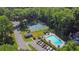 Aerial view of community pool, tennis courts, and clubhouse at 5400 Mill Run Dr, Marietta, GA 30068