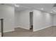 Spacious basement with recessed lights, light paint, and neutral flooring at 5400 Mill Run Dr, Marietta, GA 30068