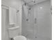 Bright bathroom features a sliding glass shower door and a white toilet at 5400 Mill Run Dr, Marietta, GA 30068