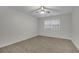 Inviting bedroom with neutral paint, wood floors, ceiling fan and window at 5400 Mill Run Dr, Marietta, GA 30068