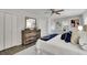 Bedroom with a comfortable bed, ceiling fan, a dresser, and lots of natural light at 5400 Mill Run Dr, Marietta, GA 30068
