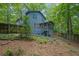 Charming two-story home with a screened porch and a lush backyard at 5400 Mill Run Dr, Marietta, GA 30068