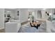 Comfortable living room offering stylish seating and seamless flow to the adjacent kitchen and dining area at 5400 Mill Run Dr, Marietta, GA 30068