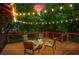 Inviting deck with comfortable seating and string lights for a relaxing evening atmosphere at 1734 8Th St, Atlanta, GA 30341