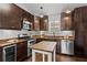 Well-equipped kitchen with stainless steel appliances, granite countertops, wine cooler, and stylish cabinetry at 1734 8Th St, Atlanta, GA 30341