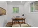 Bright office space with desk, chair, modern lighting, fresh colors and hardwood floors at 1734 8Th St, Atlanta, GA 30341