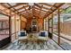 Inviting screened porch with comfortable seating, perfect for outdoor relaxation at 1734 8Th St, Atlanta, GA 30341