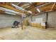 Unfinished basement showcasing concrete walls, duct work, and lighting at 2024 Lower Burris Road Rd, Canton, GA 30114