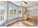 Sunlit breakfast nook with large windows, offering views of the outdoors and seamlessly connecting to the kitchen at 2024 Lower Burris Road Rd, Canton, GA 30114