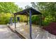 Outdoor living area featuring a stylish cabana and gazebo, perfect for relaxation and entertaining at 2024 Lower Burris Road Rd, Canton, GA 30114
