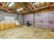 Interior view of a garage featuring shelving, storage, and supplies at 2024 Lower Burris Road Rd, Canton, GA 30114