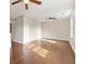 Large open living area features hardwood floors, neutral paint, ceiling fans, and lots of light at 2024 Lower Burris Road Rd, Canton, GA 30114