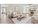 Spacious living room with fireplace, hardwood floors and bright windows at 2024 Lower Burris Road Rd, Canton, GA 30114