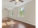 Spacious living area features hardwood floors, neutral paint, and two windows for natural light at 2024 Lower Burris Road Rd, Canton, GA 30114