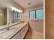 Bathroom with double vanity, large mirror and bright windows at 2041 Kramer Way, Marietta, GA 30062