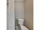 Toilet in bathroom with paneled wall and white geometric trim at 2041 Kramer Way, Marietta, GA 30062
