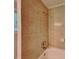 Bathroom tub featuring ceramic tile walls and showerhead at 2041 Kramer Way, Marietta, GA 30062